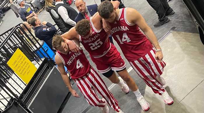 Indiana forward Race Thompson (25) had to be helped off the court after injuring his knee late in the first half. (HoosiersNow.com photo by Becky Rigel)